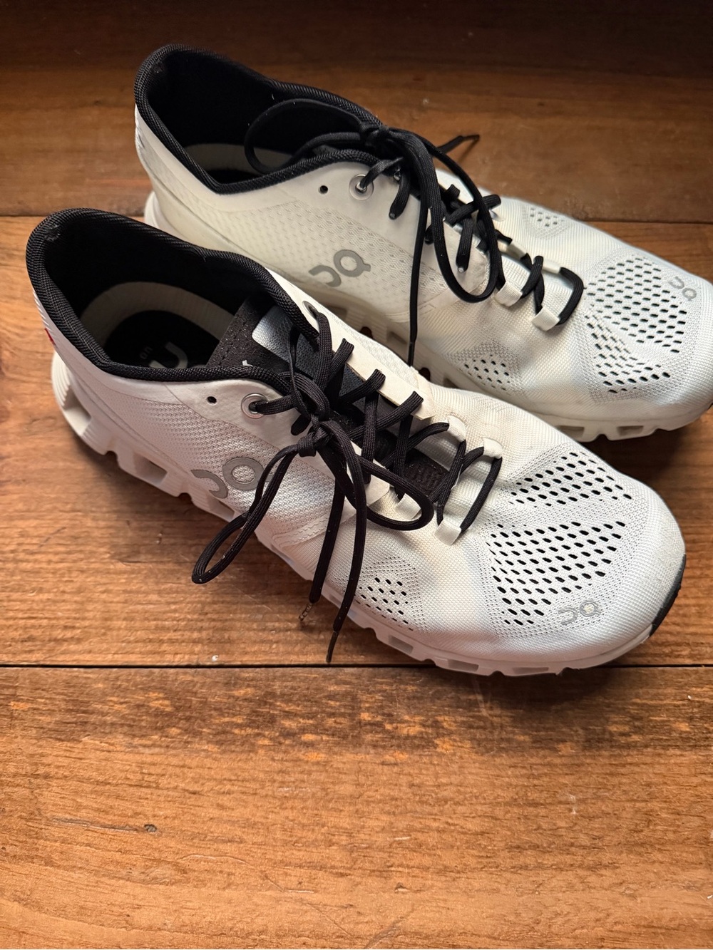 On Running Men’s White and Black Athletic Running Shoes
